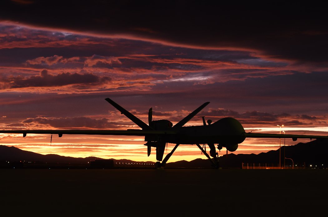 MQ-9 Reaper unmanned aircraft silhouetted against a sunset (U.S. Air Force photo)