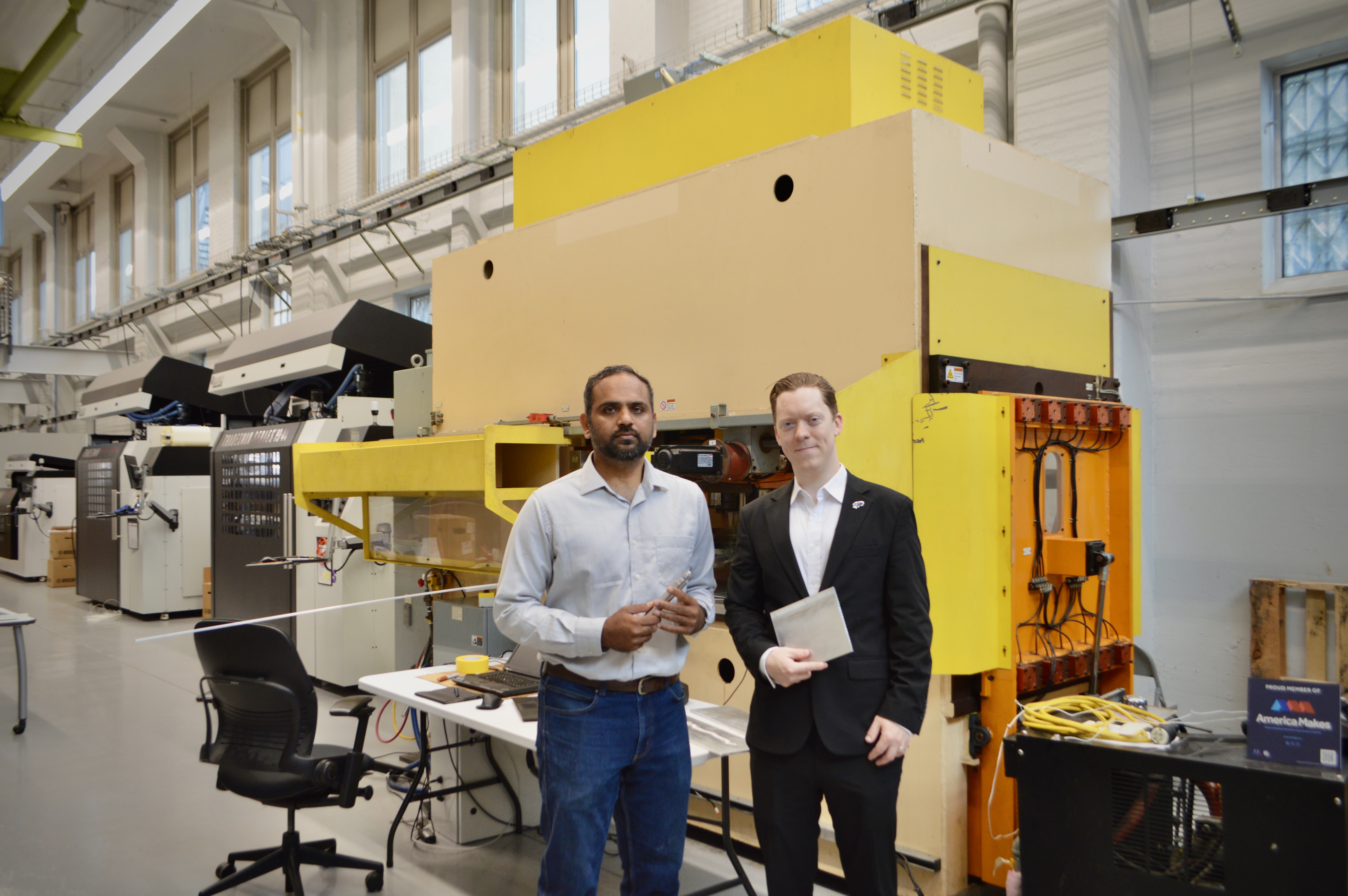 Two members of the LeapFast team on the shop floor in Youngstown